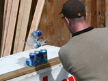 Michael Rader cutting a pyramid can set